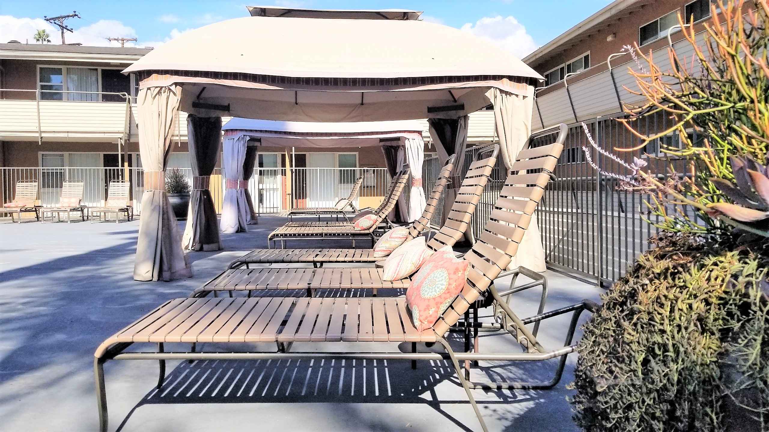 pool chair cabana lounge area at Terraces