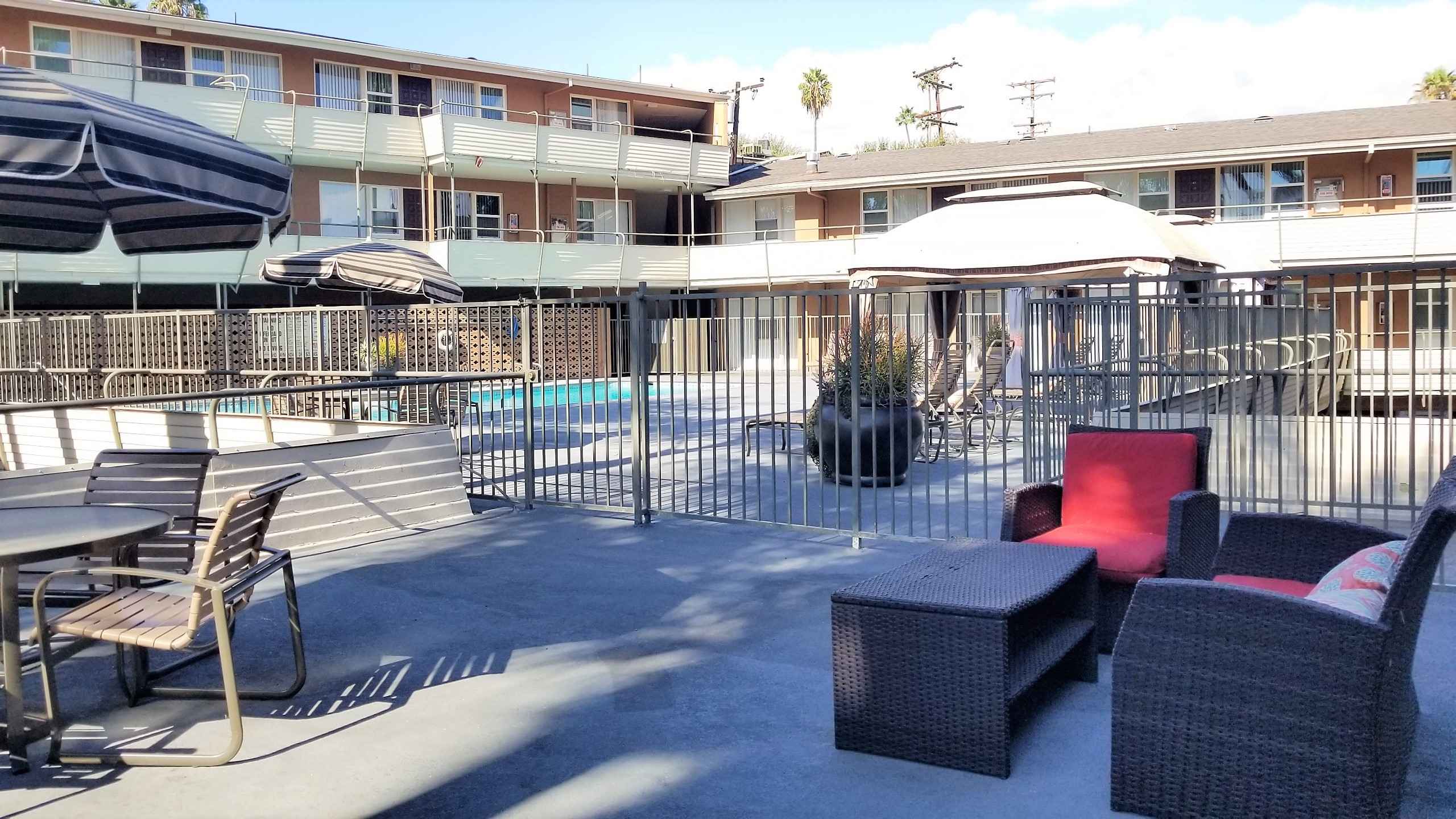 community gated pool and lounge area at Terraces