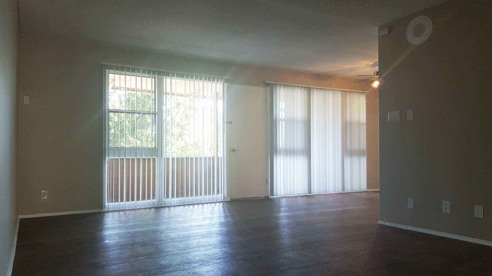 livingroom with windows at Terraces