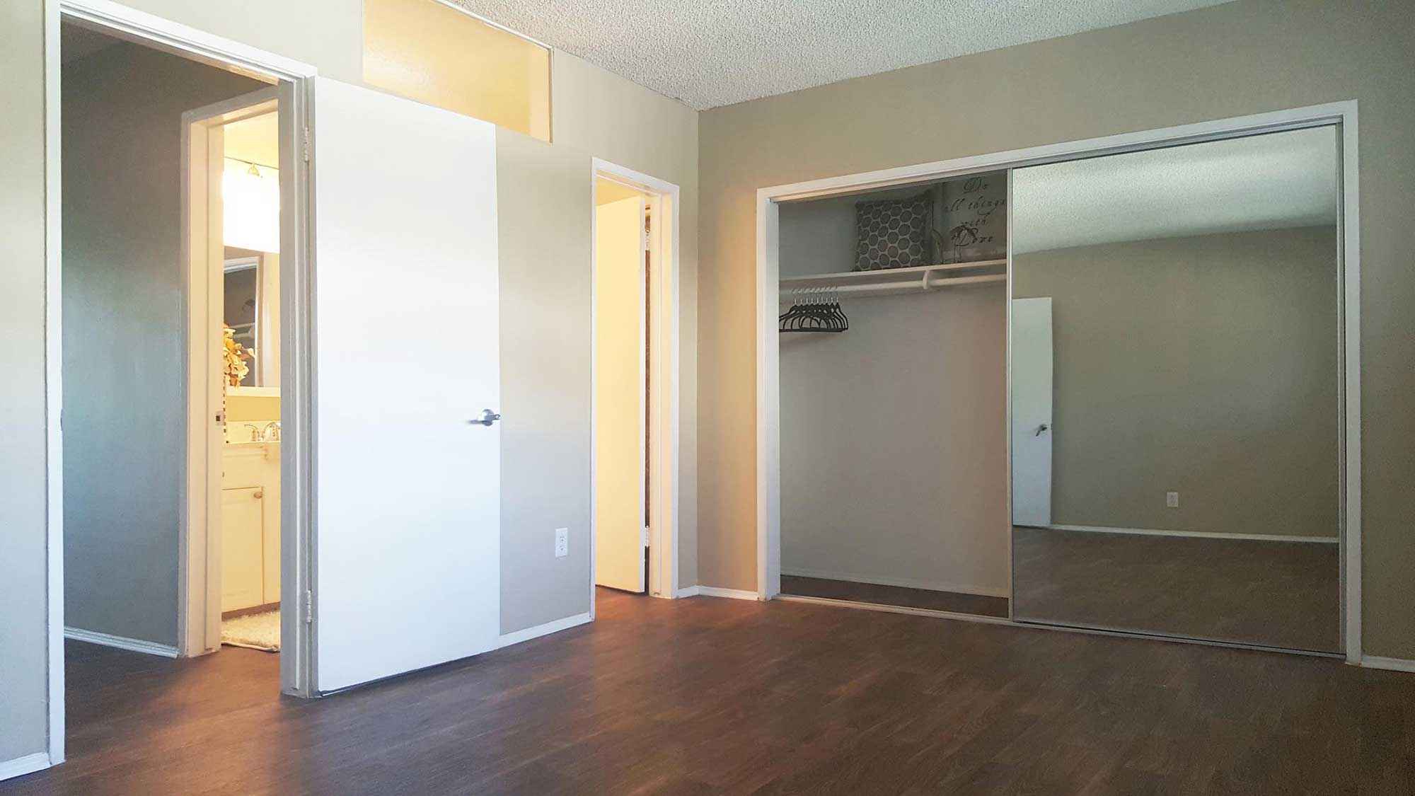 bedroom sliding glass closet door at Terraces